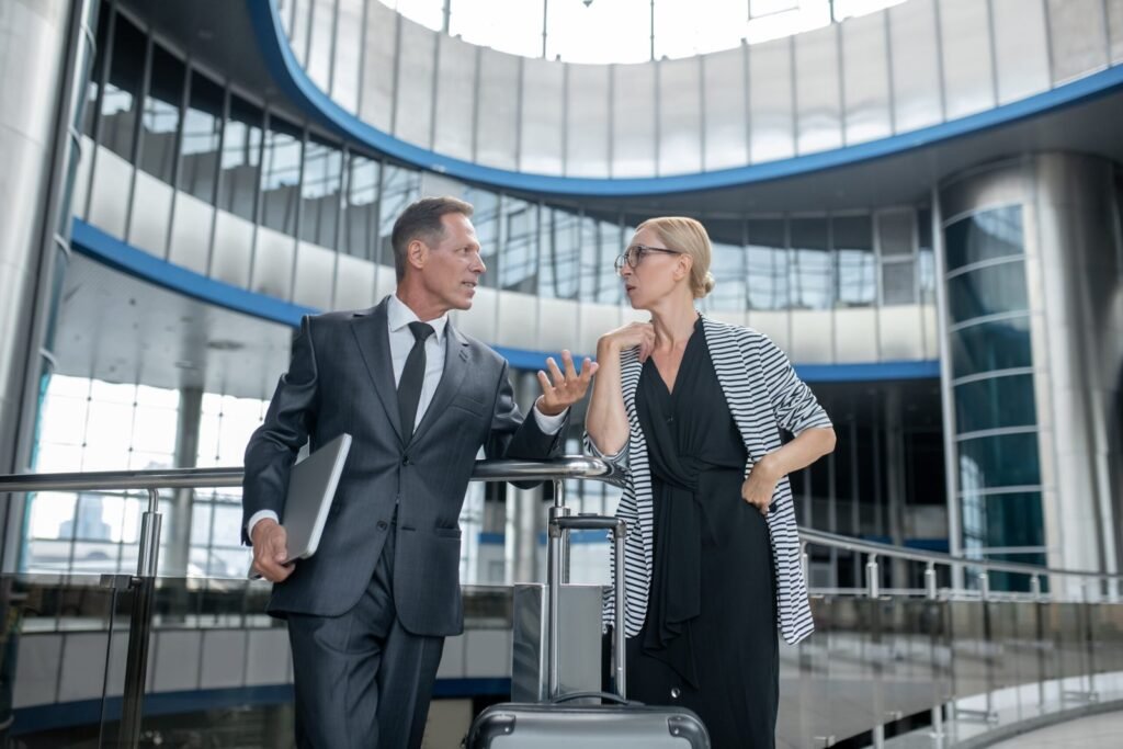 businesswoman and a businessman having a conversat 2024 10 18 04 07 22 utc scaled.jpg